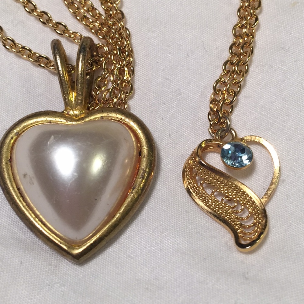 Lot of two gold tone heart necklaces